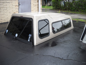 0832 97-03 F150 Reg Cab 8ft Bed wedge style cap